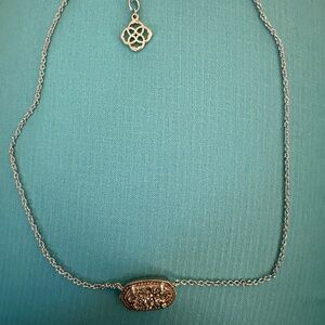 Elegant Silver Necklace with Intricate Pendant